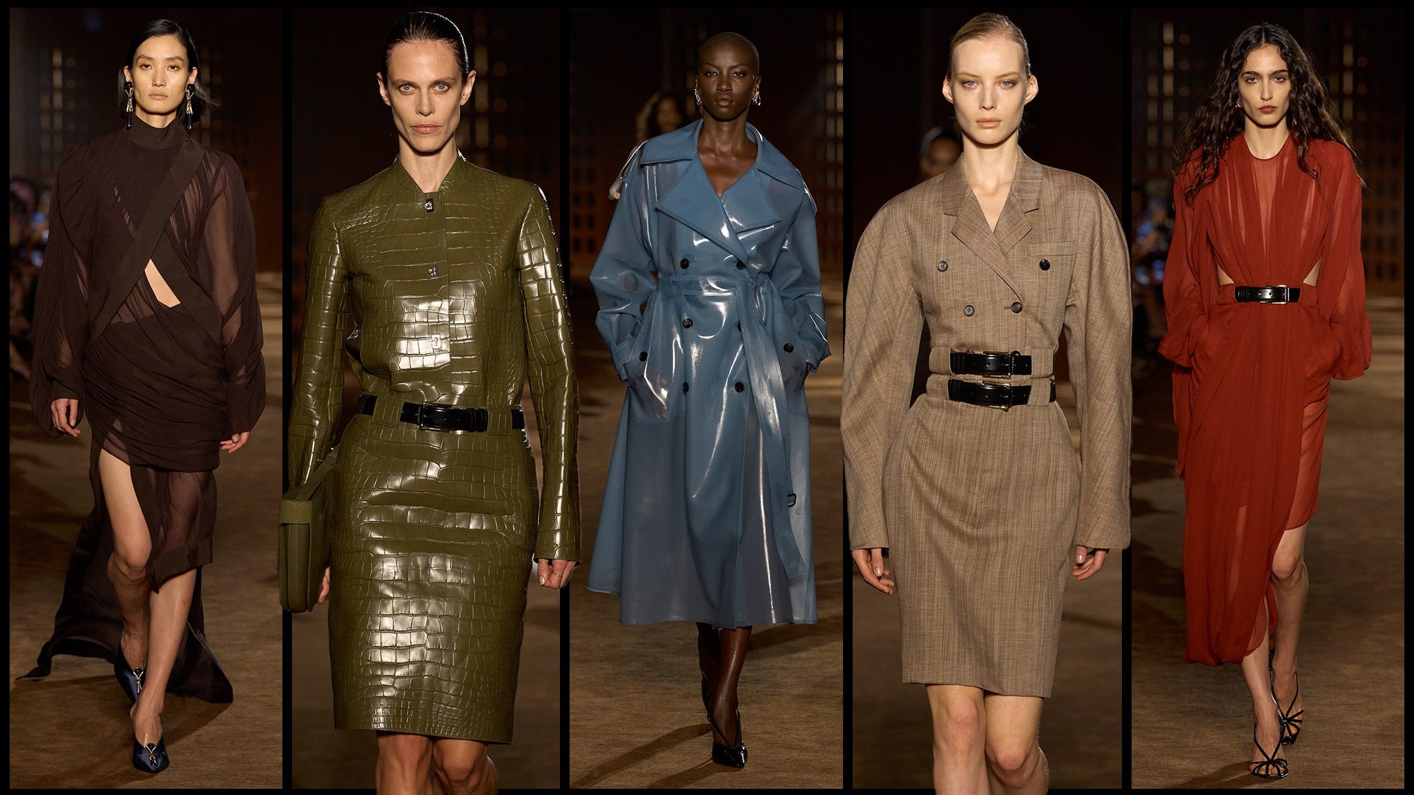 a number of runway models in suits