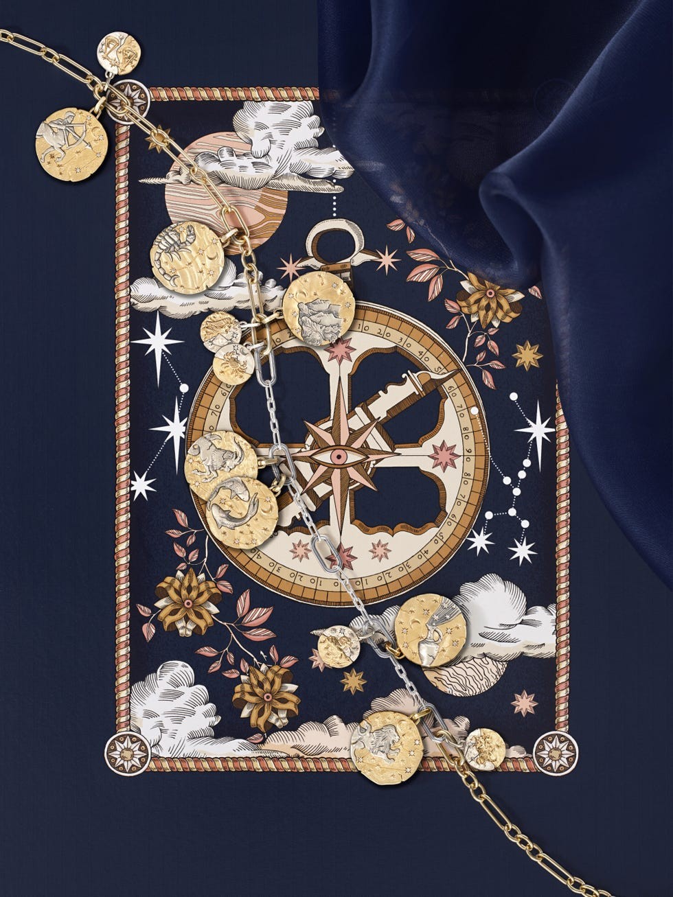 Artistic composition featuring a compass and decorative celestial-themed coins against a dark background.