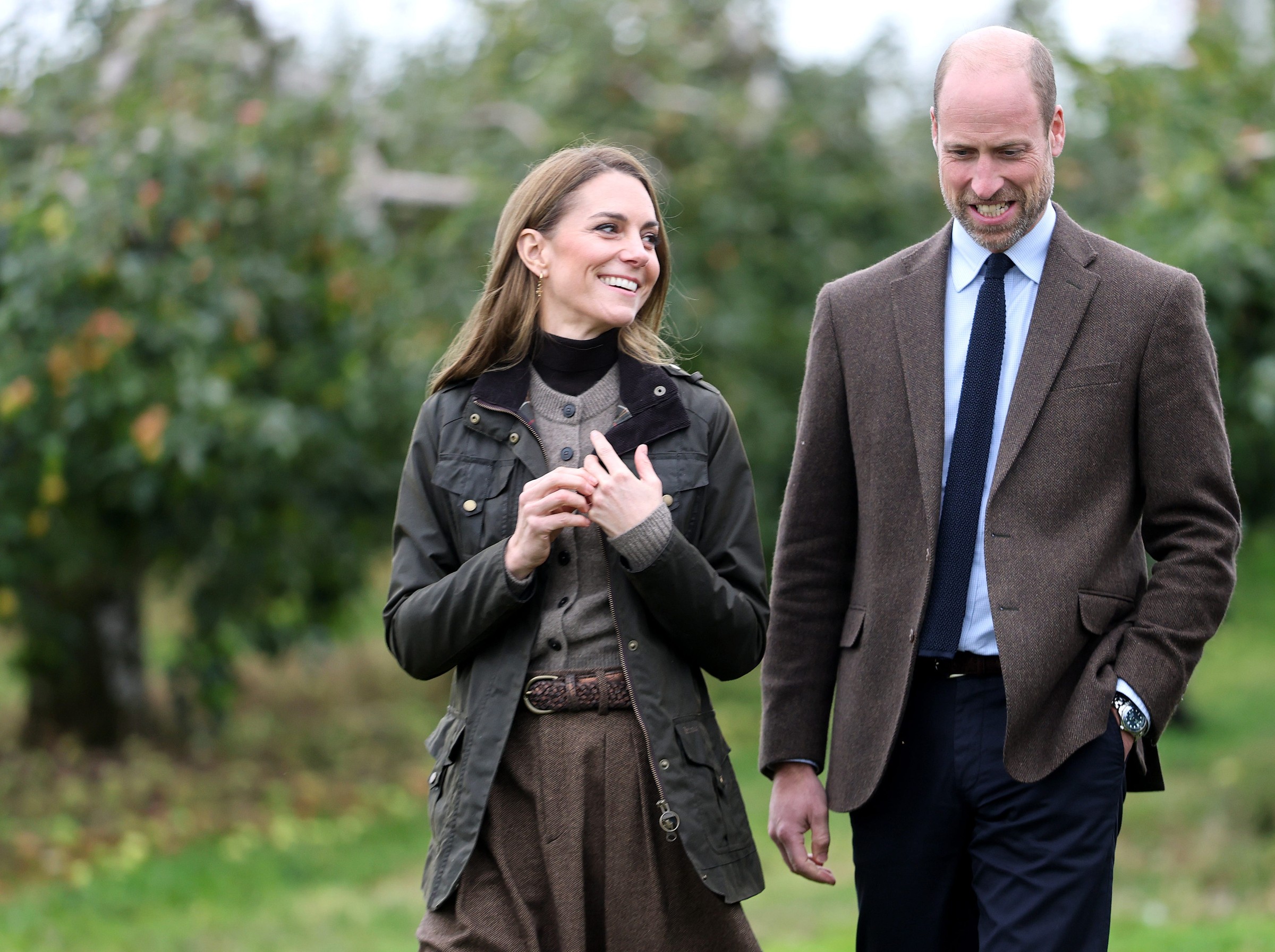 cookstown, northern ireland october 14 catherine, princess of wales and prince william, prince of wales walk in the orchards as they visit to long meadow cider on october 14, 2025 in craigavon, northern ireland long meadow has been owned by the mckeever family for three generations and has been cultivating premiumquality apples since 1968 the prince and princess of wales are visiting organisations providing creative and entrepreneurial opportunities for young people in rural areas of northern ir