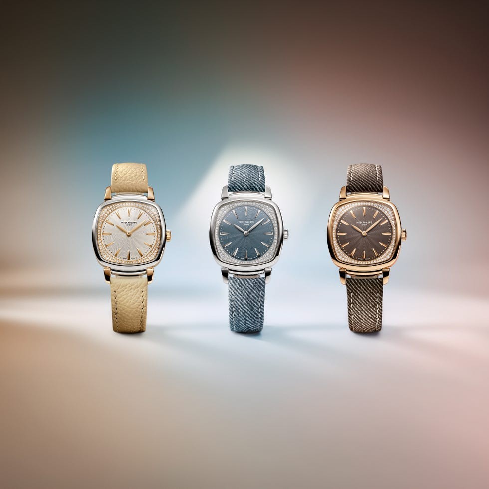 Three elegant square watches with different straps and dials arranged side by side on a softly lit background.