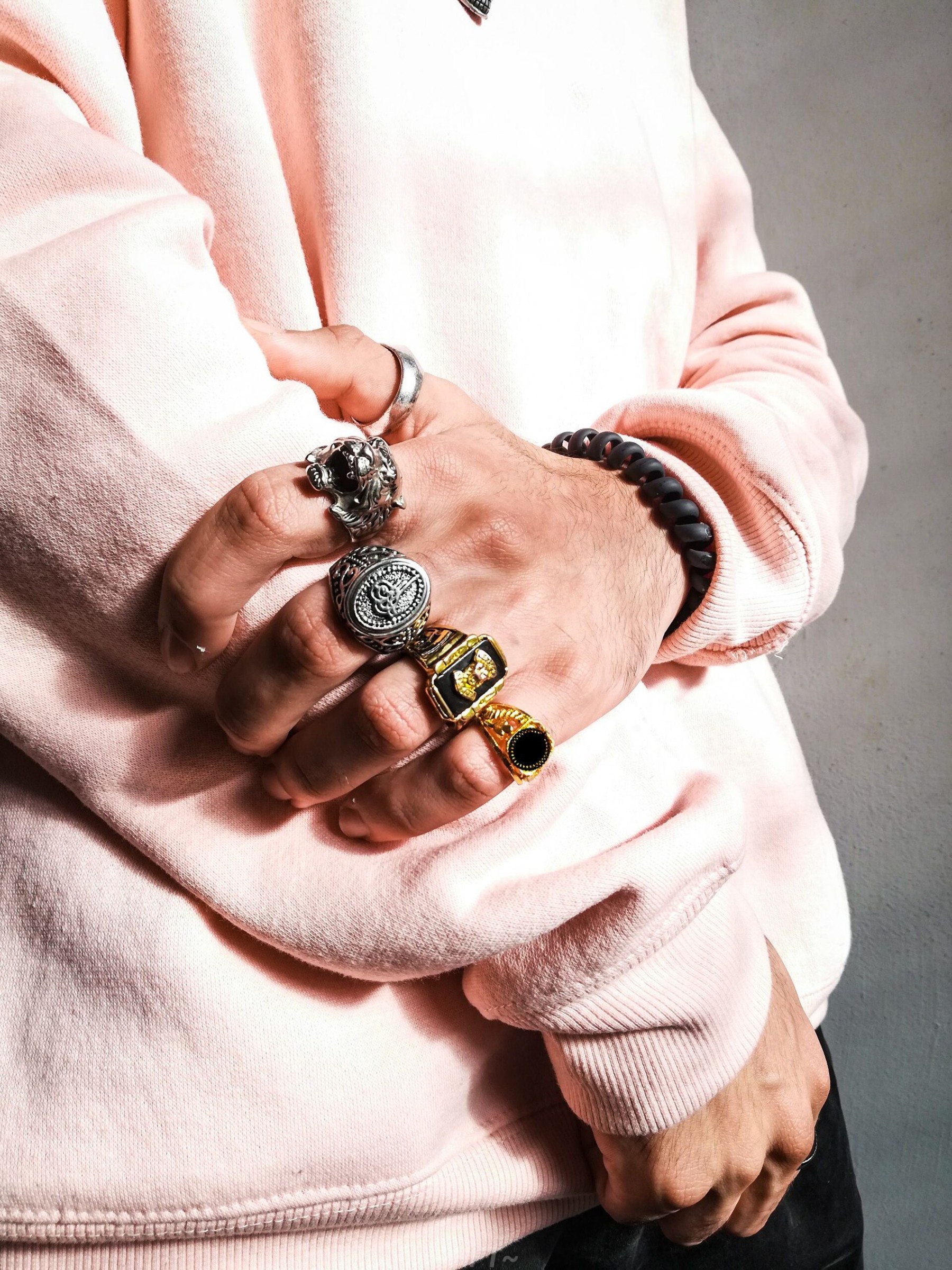 man wearing rings