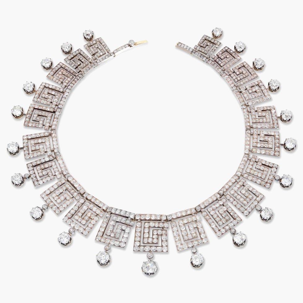 Elegant necklace featuring geometric patterns and sparkling gemstones.