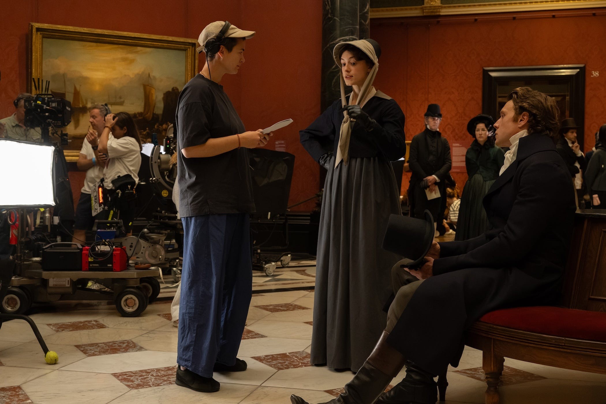 4258d03500461rl to r director georgia oakley with actors daisy edgar jones and george mackay on the set of their film sense and sensibility, a focus features releasecredit alex bailey © 2026 focus features llc
