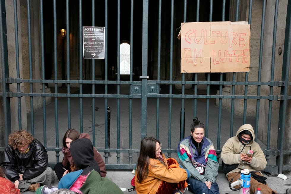 protesters block an entrance to the louvre museum to express their “support” for the high school students’ movement and to denounce police repression in paris on october 19, 2026, two days after riots and looting occurred on the sidelines of nationwide cost ofliving demonstrations french authorities scrambled to stem public discontent fuelling mass demonstrations that over the weekend spilled over into some of the worst street violence in recent years some half a million people turned out across