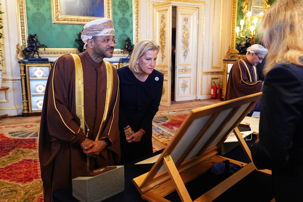 windsor, england october 20 sophie, duchess of edinburgh stands with members of the oman delegation viewing a display of items from the royal collection in the green drawing room at windsor castle, castle during the state visit of the sultan of oman to the uk on october 20, 2026 in windsor, england sultan haitham bin tarik, sultan of oman, is on a threeday state visit to the uk photo by aaron chown wpa poolgetty images