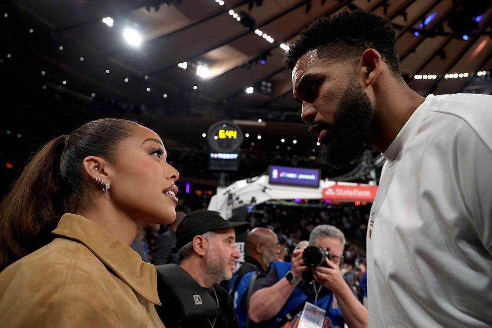new york, new york october 20 karlanthony towns 32 of the new york knicks speaks with jordyn woodstowns prior to the ring ceremony before the game against the philadelphia 76ers at madison square garden on october 20, 2026 in new york city note to user user expressly acknowledges and agrees that, by downloading and or using this photograph, user is consenting to the terms and conditions of the getty images license agreement photo by sarah stiergetty images