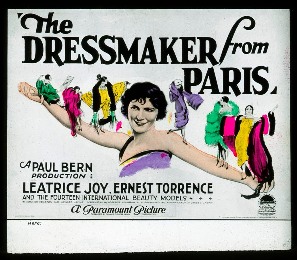 Vintage movie poster for "The Dressmaker from Paris" featuring a smiling woman and colorful dresses.