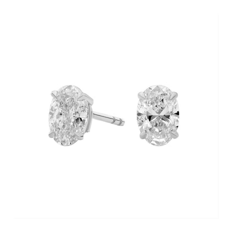 Oval Cut Diamond Stud Earrings In 14K White Gold