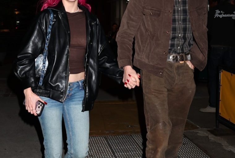 exclusive new york city, ny musician adéla and her boyfriend jackson shanks were leaving dinner at the popular restaurant bar pitti in new york city the couple stepped out for the evening meal following a performance on the tonight show starring jimmy fallon the pair held hands while walking down the sidewalk, with adéla showcasing her bright pink hair in a black leather jacket, sheer brown top, and blue jeans beside her, shanks opted for a brown suede jacket layered over a plaid shirt and brown