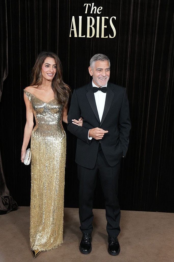 us actor george clooney and lebanese british barrister amal clooney pose upon arrival to attend the albies hosted by the clooney foundation of justice at the natural history museum in london on october 9, 2026 photo by carlos jasso  afp via getty images