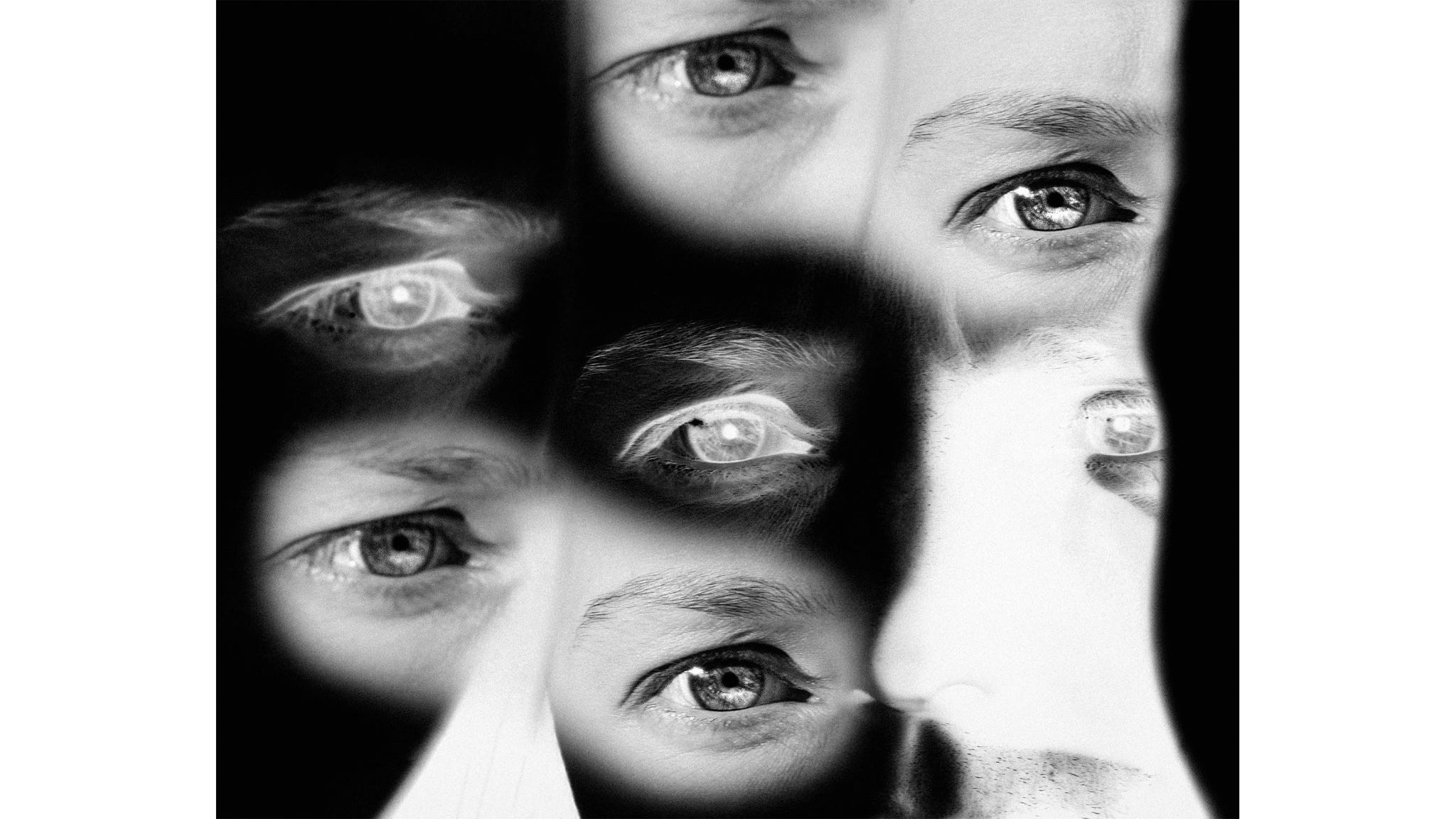Collage of multiple eyes in black and white, conveying emotion and depth.